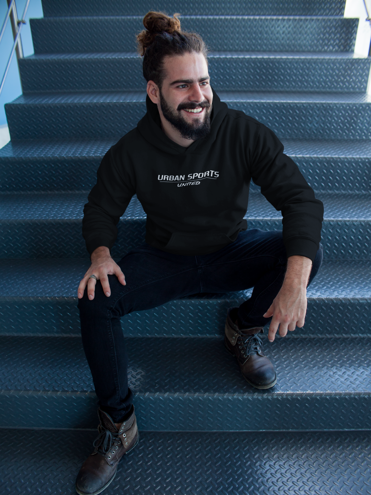 pullover-hoodie-mockup-being-worn-by-a-man-on-metal-stairs-a17760