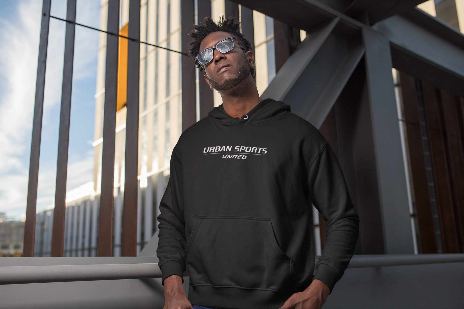 pullover-hoodie-mockup-of-a-man-looking-at-the-sun-in-the-city-24315